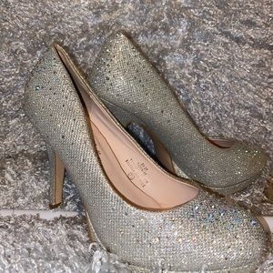 Beautiful silver heels.